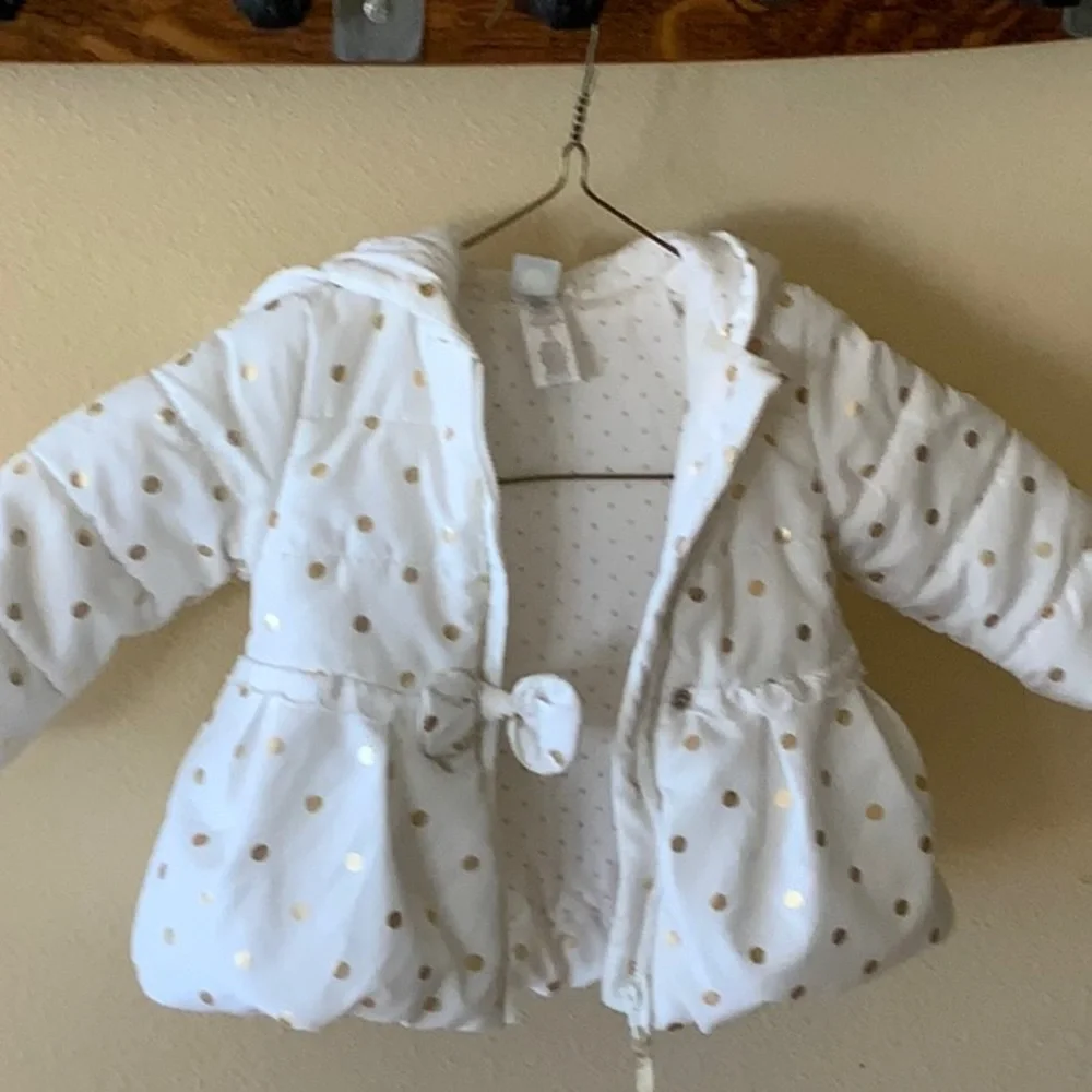 White Jackets with gold circles. Puffy. Like new. size = 12 months